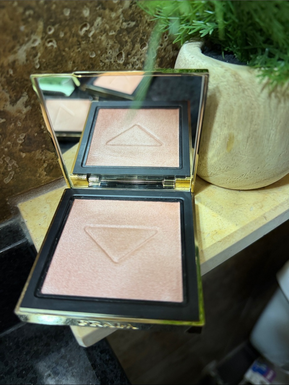 Prada Light Glowing Highlighter Powder 002 $90